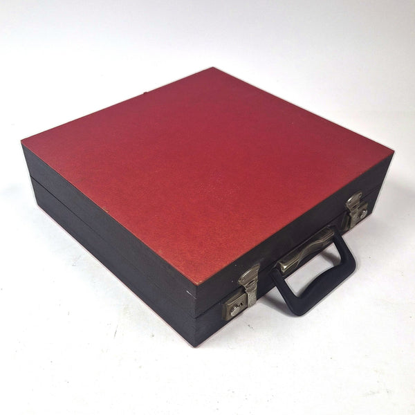 Vintage rood-zwarte platenkoffer met harmonicavakken voor 18 LP's