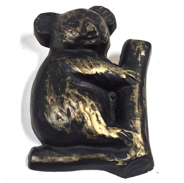 Vintage wandplaquette van gips met koala op boomstam