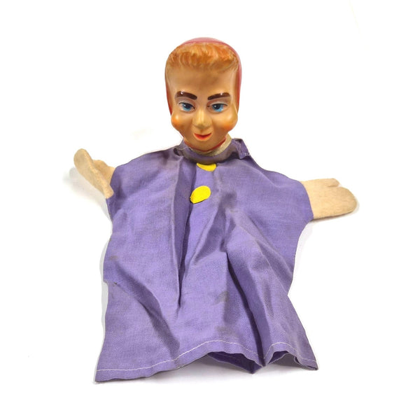Vintage handpop oma met vinyl hoofd en paarse jurk