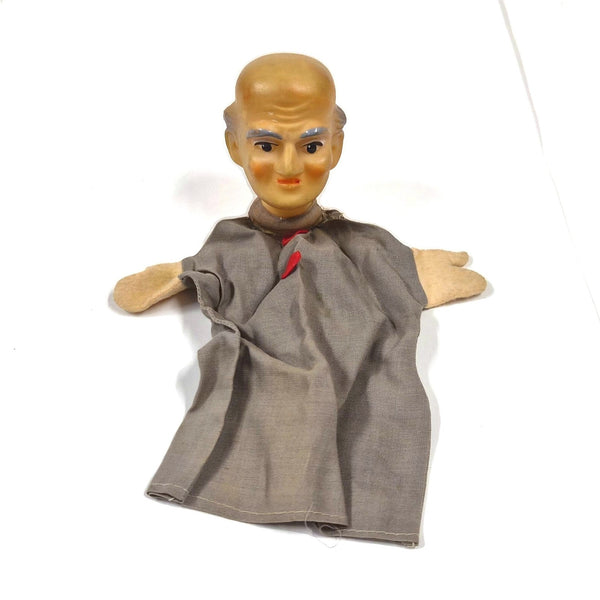 Vintage handpop opa met vinyl hoofd en grijs pak