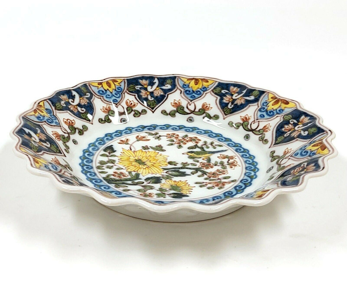 Vintage Makkum 1010 porseleinen wandbord met blauwe en gele bloemen