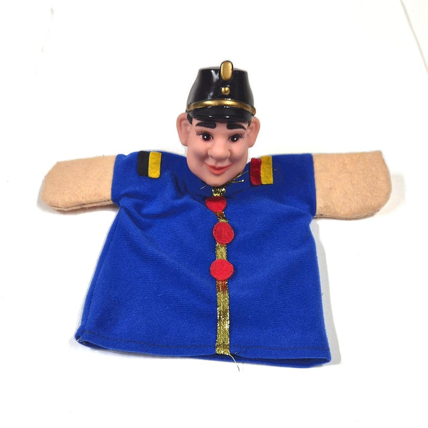 Vintage handpop officier met vinyl hoofd en blauw uniform