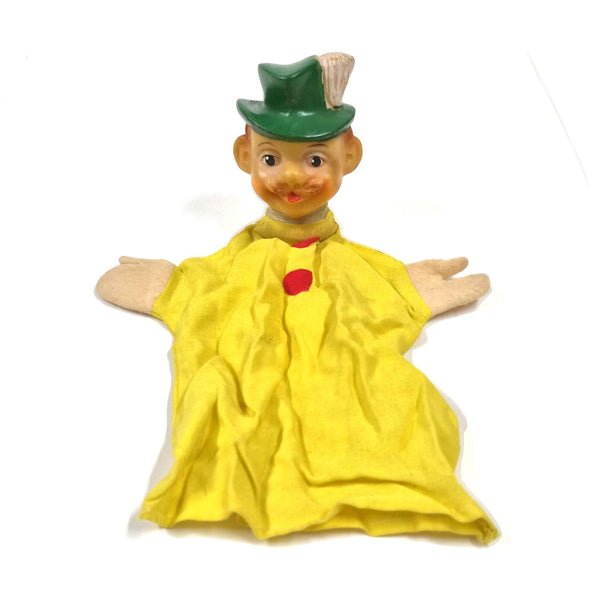 Vintage handpop heer met vinyl hoofd, groene hoed en gele jas