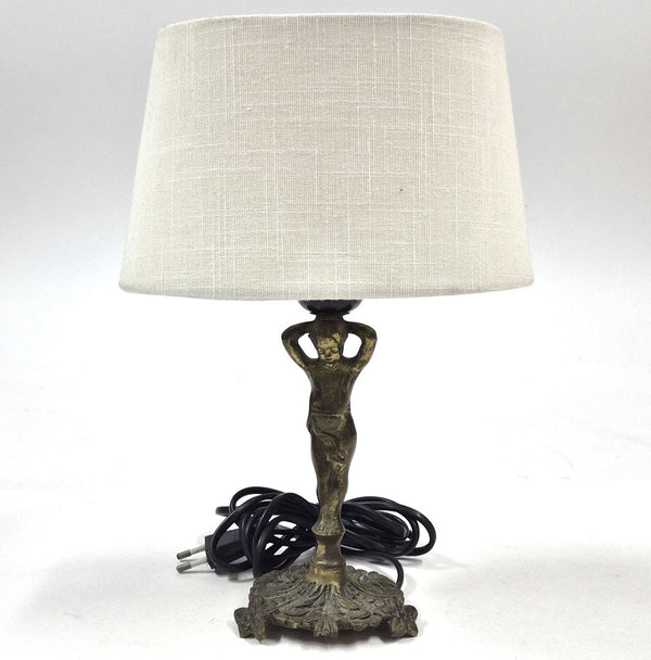 Vintage tafellamp met vrouwenfiguur en stoffen kap