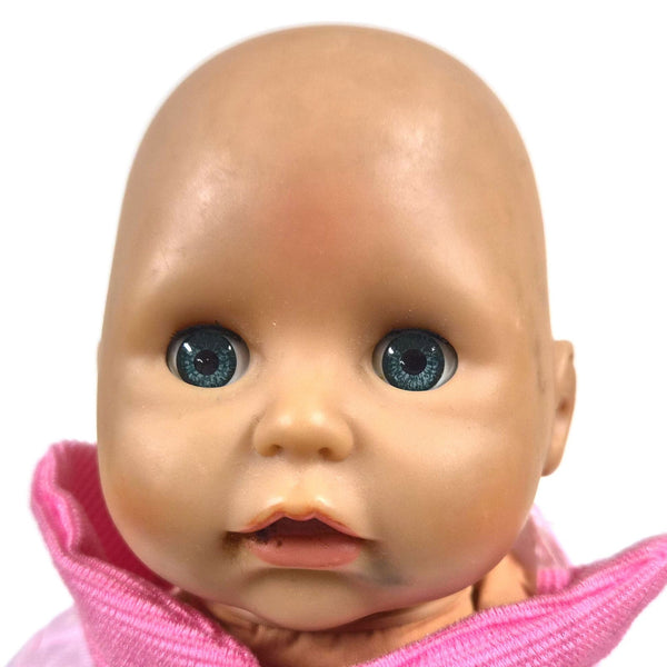 Zapf Creations babypop ZFC 14/A met blauwe slaapogen, roze outfit