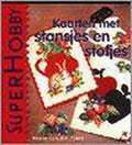 Kaarten met stansjes en stofjes - van den Akker